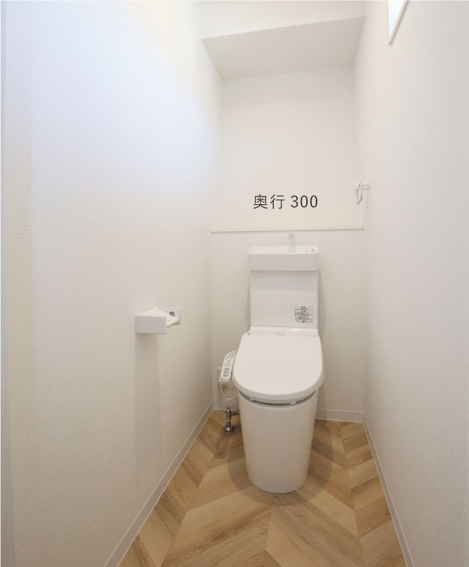 ヘリンボーン柄の床の2階トイレ